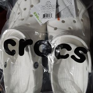 New with tags unisex Crocs size 11, 12,